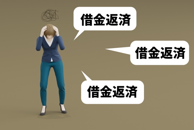 お金を手に頭を抱える。にかほ市で債務整理の無料相談が弁護士にできます